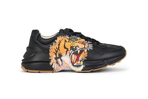 rhyton gucci logo leather sneakers|gucci rhyton tiger print.